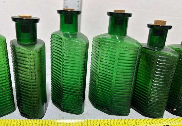 Collection of CLC Company Green Glass Medicine Bottles