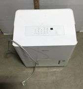 Midea Dehumidifier - Powers On When Plugged In