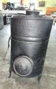 Antique Reeves Dover Tin Stove (27”T,21” L,16”D)