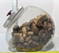 Glass Cookie Jar Containing Various Sizes of Corks