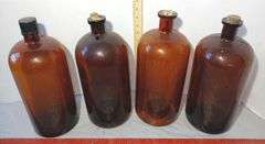 Four 13" Tall Brown Glass Apothecary Bottles