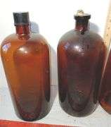 Four 13" Tall Brown Glass Apothecary Bottles