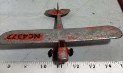 Diecast Hubley Piper Cub Airplane, Simplex Toy Typewriter, Metal Dollhouse Cabinet & Children’s Leat