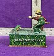 Vintage Cast Iron Mechanical Coin Bank “The One That Got Away”