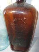 Two Large Glass Bottles from Detroit