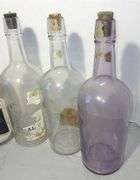 Collection of Clear & Purple Old Liquor Bottles