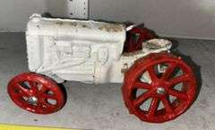 Two Cast Iron Fordson Tractors & McCormick Deering Cast Iron Tractor