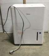 Midea Dehumidifier - Powers On When Plugged In