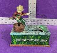 Vintage Cast Iron Mechanical Coin Bank “The One That Got Away”