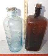 Two Large Glass Bottles from Detroit
