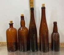Tote with Lid Filled with Vintage Glass Bottles