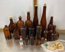 Tote with Lid Filled with Vintage Glass Bottles