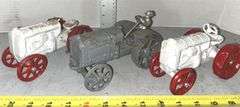 Two Cast Iron Fordson Tractors & McCormick Deering Cast Iron Tractor