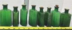 Collection of CLC Company Green Glass Medicine Bottles