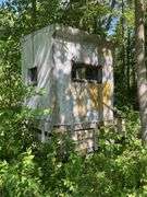 5'x5' Hunting Shack Mounted to Trailer Buyer Responsible for Removal