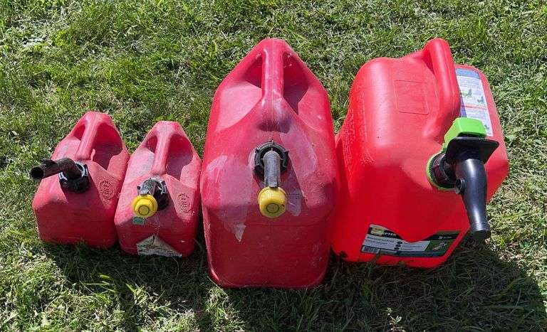 Four Various Gas Cans