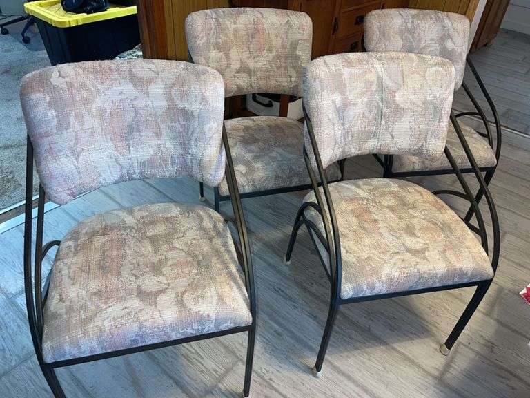 Four Matching Cushioned Chairs
