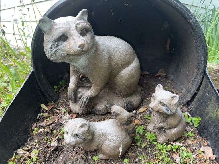 Three Raccoon Statue Three Plastic Raccoon Statues - Sherwood Auctions