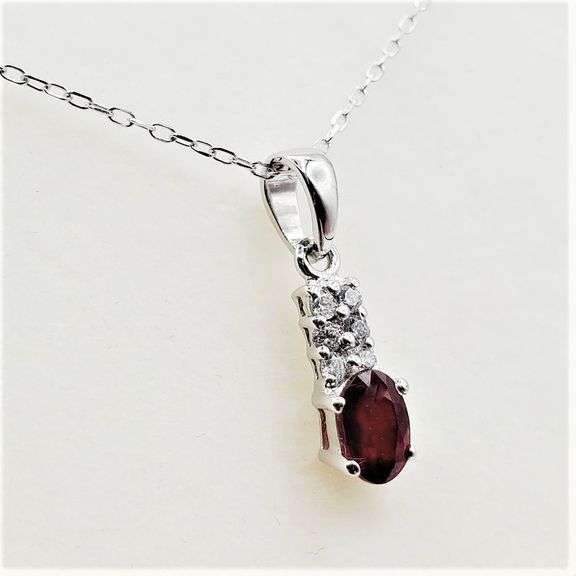 Sterling Silver Natural Enhanced Ruby (0.40ct) and CZ (0.15ct) with Sterling Silver Chain