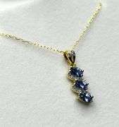 Gold Plated Sterling Silver Natural Tanzanite (0.75ct) and CZ (0.10ct) Pendant with Gold Plated Ster