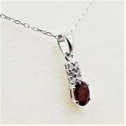Sterling Silver Natural Enhanced Ruby (0.40ct) and CZ (0.15ct) with Sterling Silver Chain