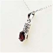 Sterling Silver Natural Enhanced Ruby (0.40ct) and CZ (0.15ct) with Sterling Silver Chain