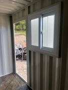 Unused 2025 12' Container. With 1 Door & 1 Window.
