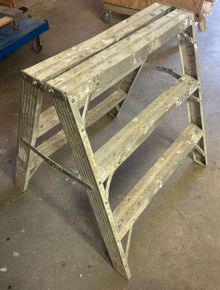 sawhorse and a step ladder