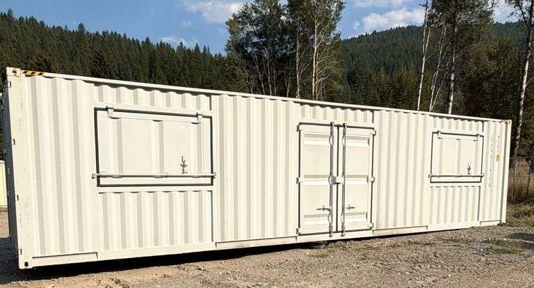 40ft High Cube Office Container~ 1 Tripper, One End Door, One Front Door 2 Windows~Dents on back~