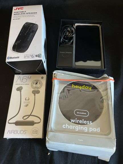 (1 Qty) Wireless Earbuds (1 Qty) Wireless Charging Pad (1 Qty) JVC Portable Wireless Speaker (1 Qty)