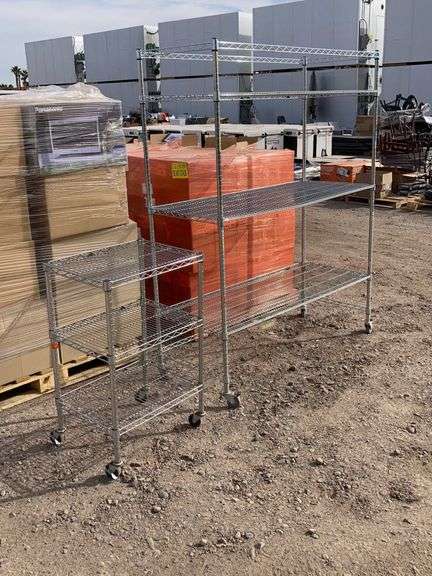 (2) Rolling stainless steel shelving racks. - Sierra Auction Management Inc