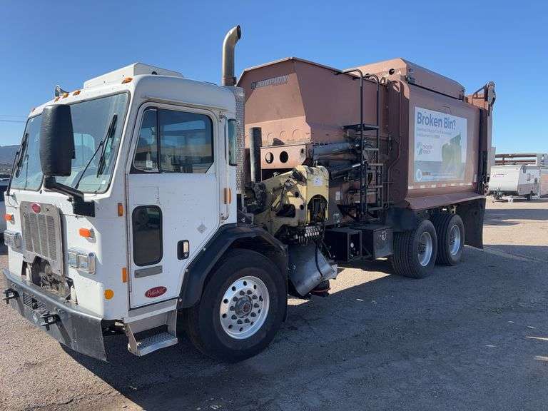 2014 Peterbilt 320 Garbage Truck Side Loader
