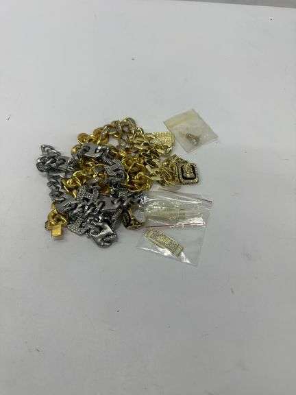 Assorted Costume Jewelry including (2) Necklaces, (1) Ring, (1) Bracelet, (1) Charm, (1) Set Of Stud