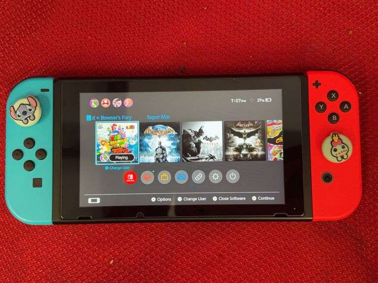 (1 Qty) Nintendo Switch w/ Games & Charger