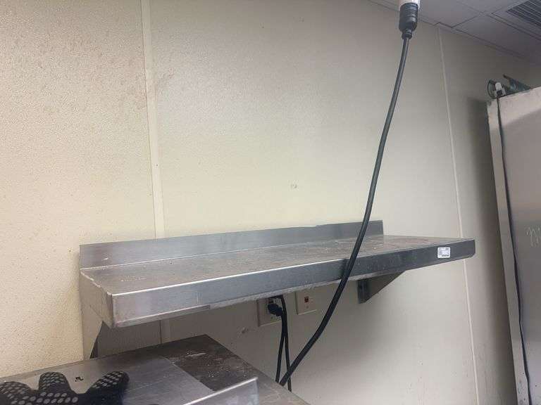 Stainless steel Table W/Bottom Shelf & Water Spicket 60" x 30" x 36" (Contents Not Included)