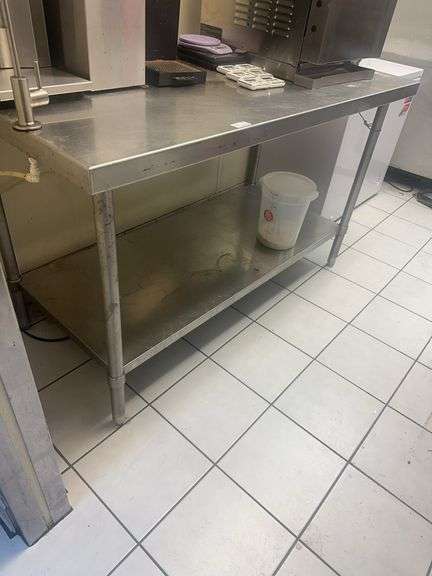Stainless steel Table W/Bottom Shelf & Water Spicket 60" x 30" x 36" (Contents Not Included)