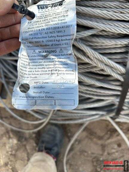 Multiple Rolls Of Stainless Cable