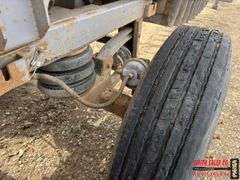 2009 Trail King Quad Axle Belt Trailer