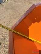 Orange Self Dumping Hopper