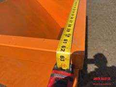 Orange Self Dumping Hopper