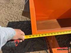 Orange Self Dumping Hopper