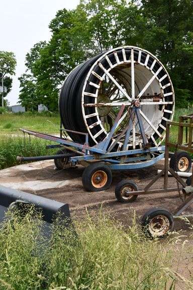 Older Hard Hose Traveler and Sprayer Gun