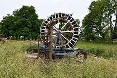 Older Hard Hose Traveler and Sprayer Gun