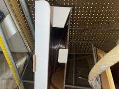 Vinyl Tubing rack with rolls of tube.