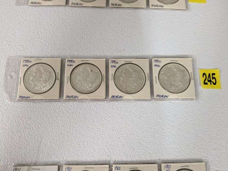 Lot of four 1885 O Morgan Silver Dollars