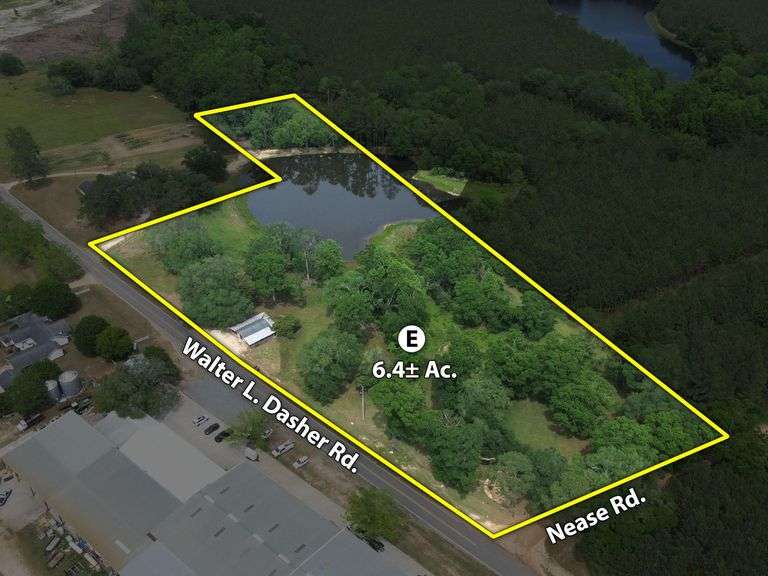 6.4 acres, shared pond, barn
