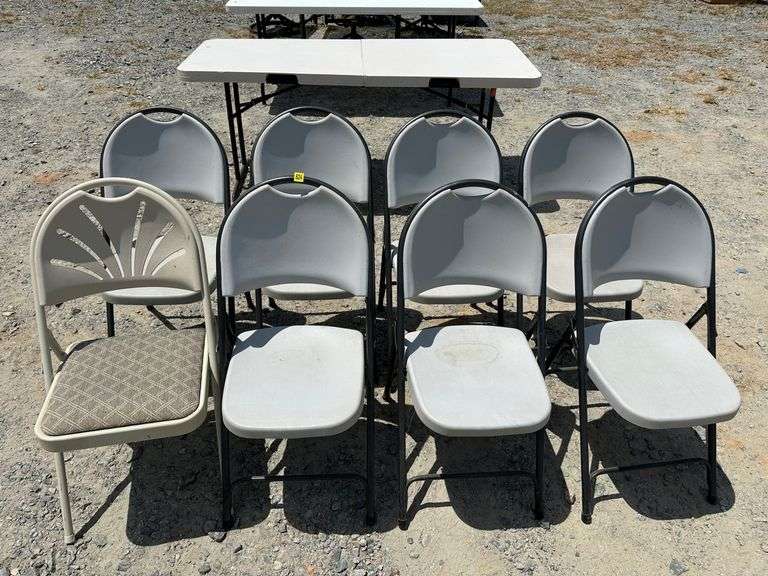 Eight Folding Chairs
