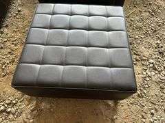 Black Upholstered Chair and Matching Ottoman