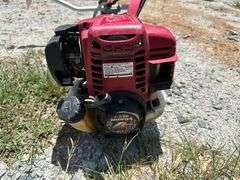 Honda 4-Stroke Gas-Powered String Trimmer with Shoulder Harness