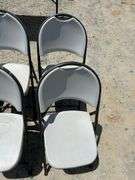Eight Folding Chairs